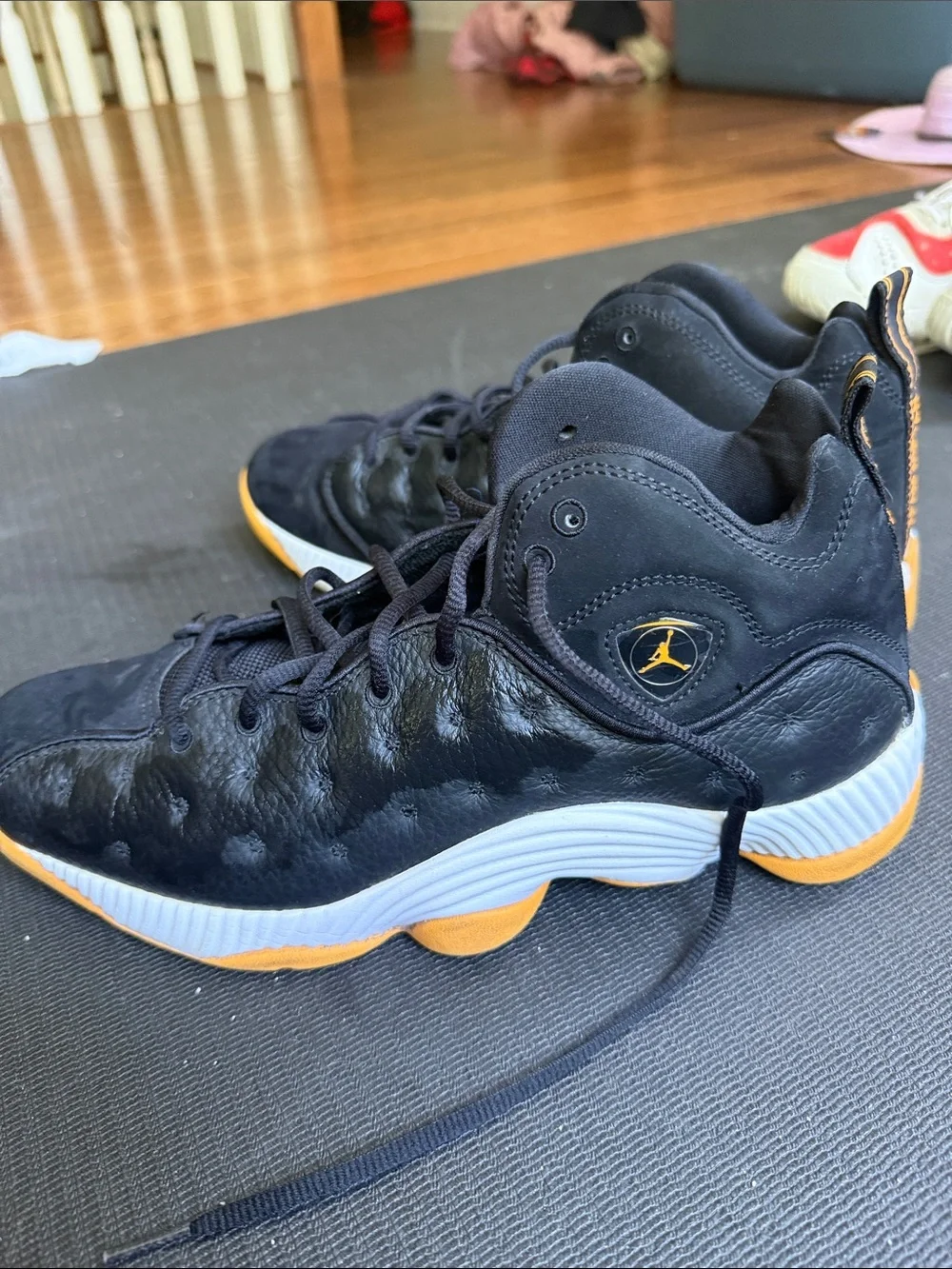 Jordan Men’s Black & Gold Low-Top Basketball Sneakers